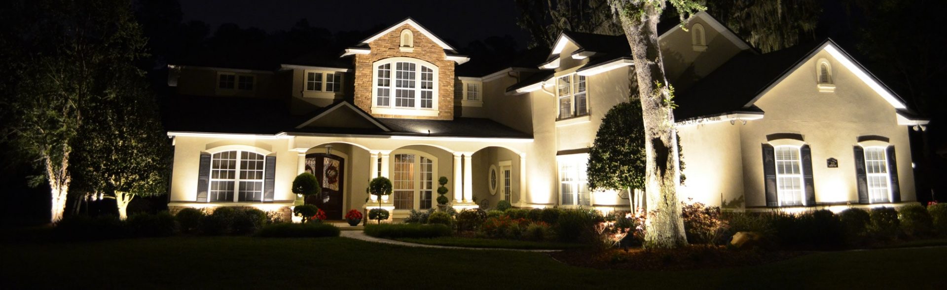 Home with yard lighting
